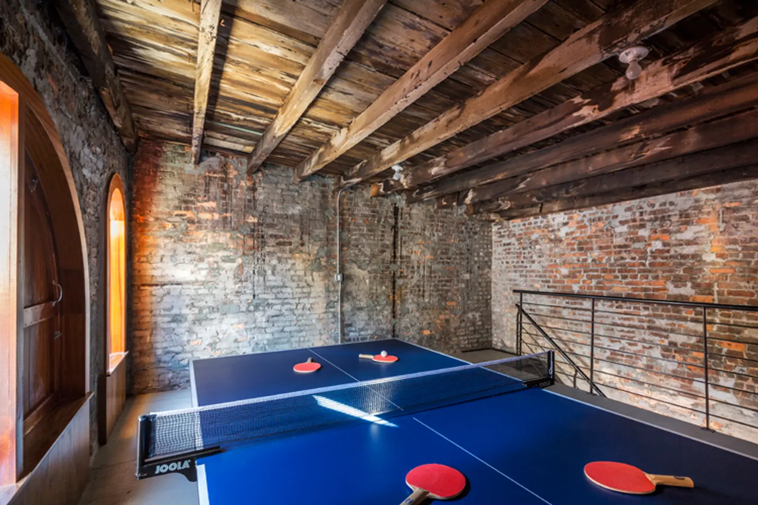 Ping pong table inside Reeve Place house designed by Barker Freeman