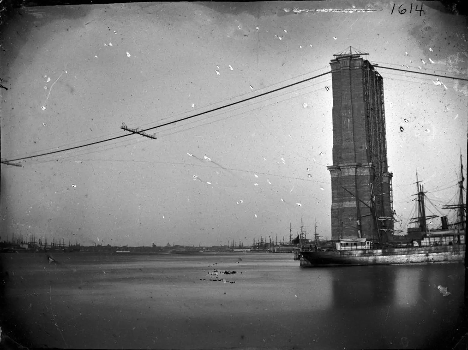 A 19th-century photo of the Brooklyn Bridge under construction.