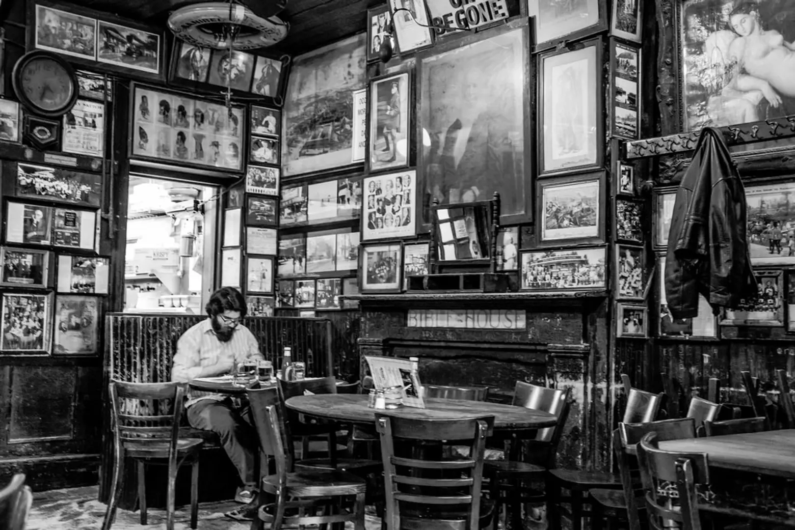 Art covers the walls inside McSorley's.