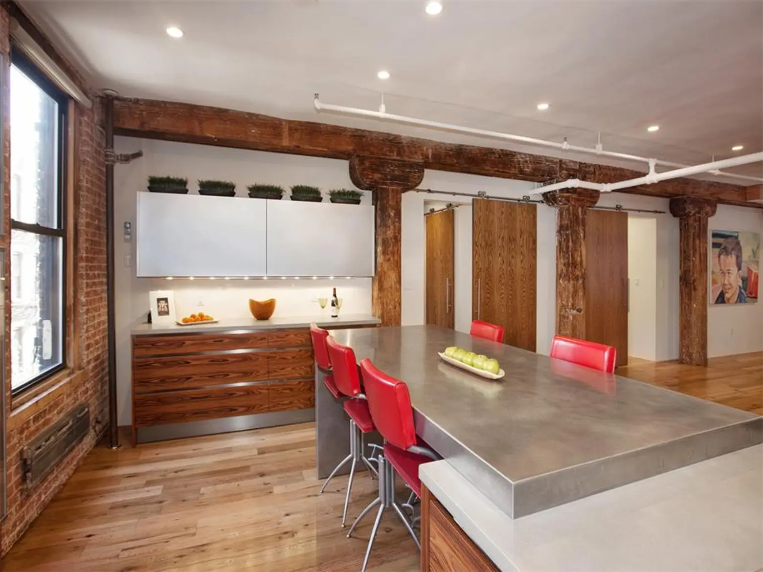 wood beams, hardwood floor, renovated chelsea loft, chef's kitchen, state-of-the-art appliances