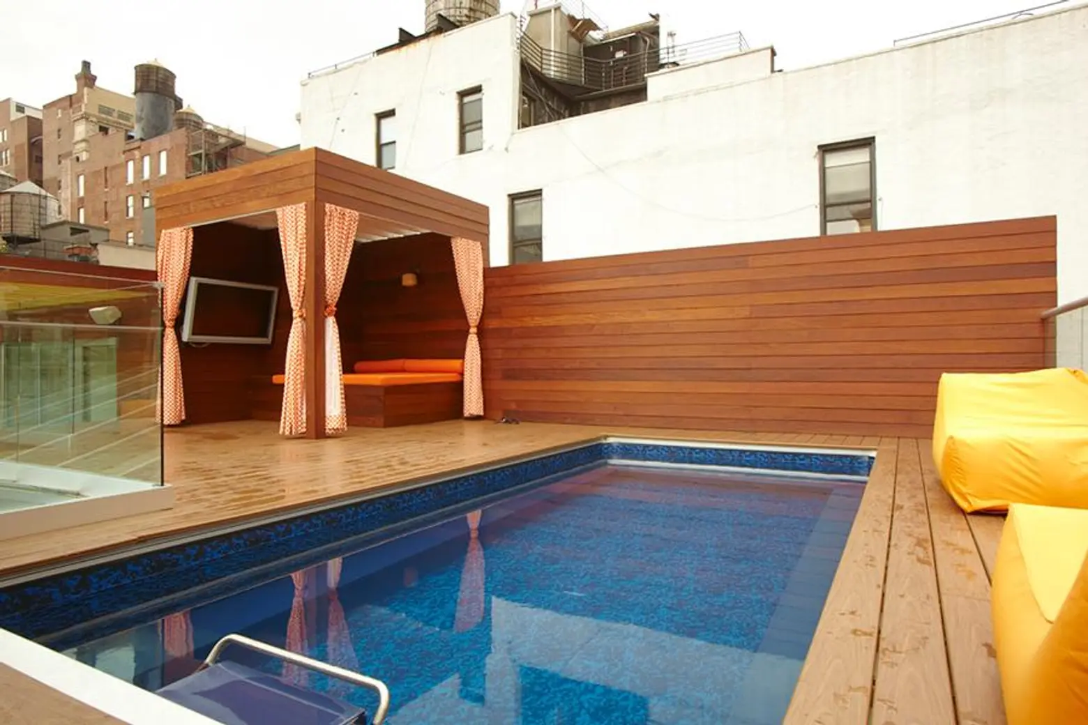 17 East 17th Street, apartment with rooftop pool, floating glass staircase, renovated historic landmark building