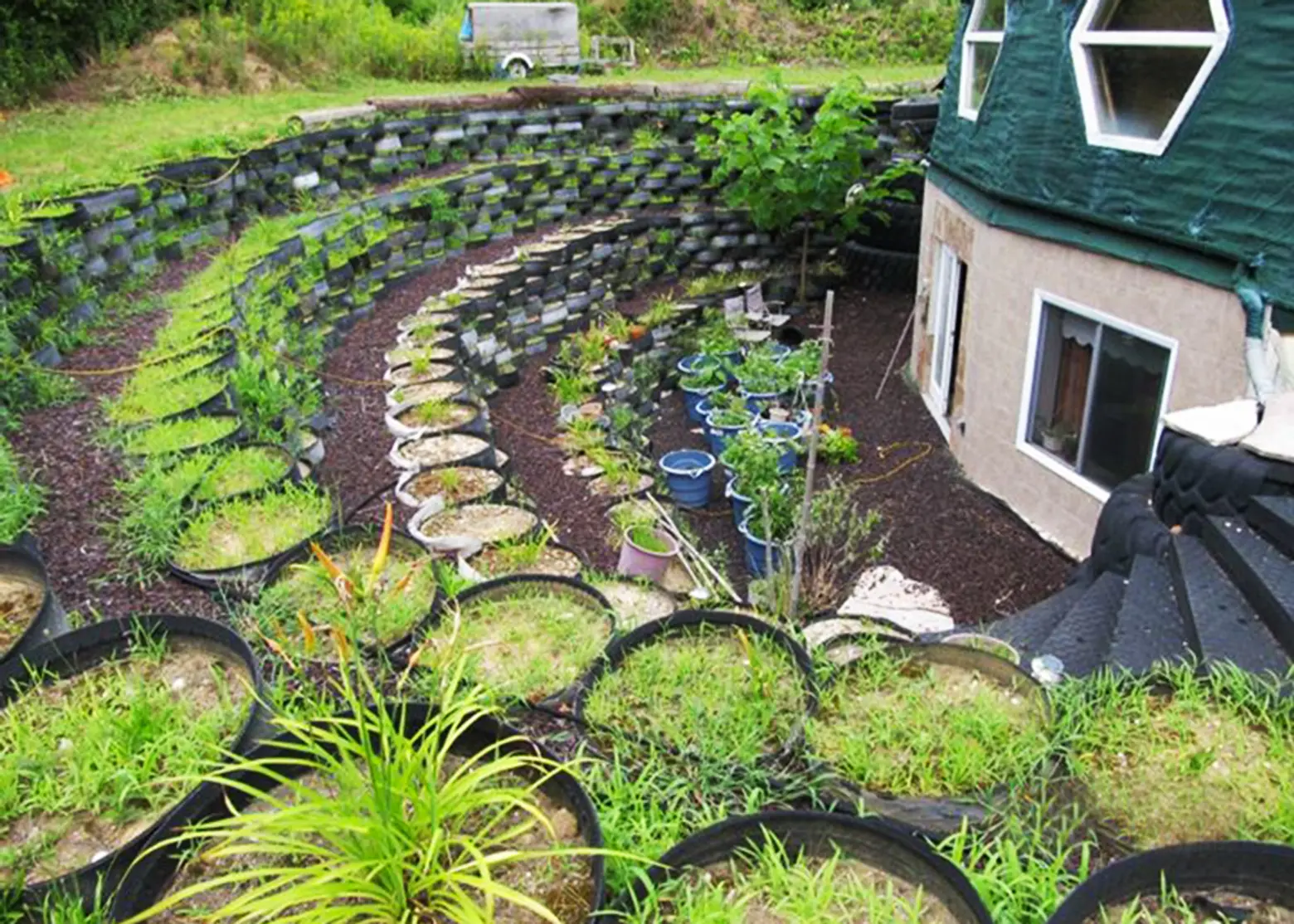 Kevin Shea, Long Island Green Dome, family home, largest geodesic dome-home in the world, terraced garden, recycled tires, green roof, spider web green roof, fruit trees, crosed circulation, daylight