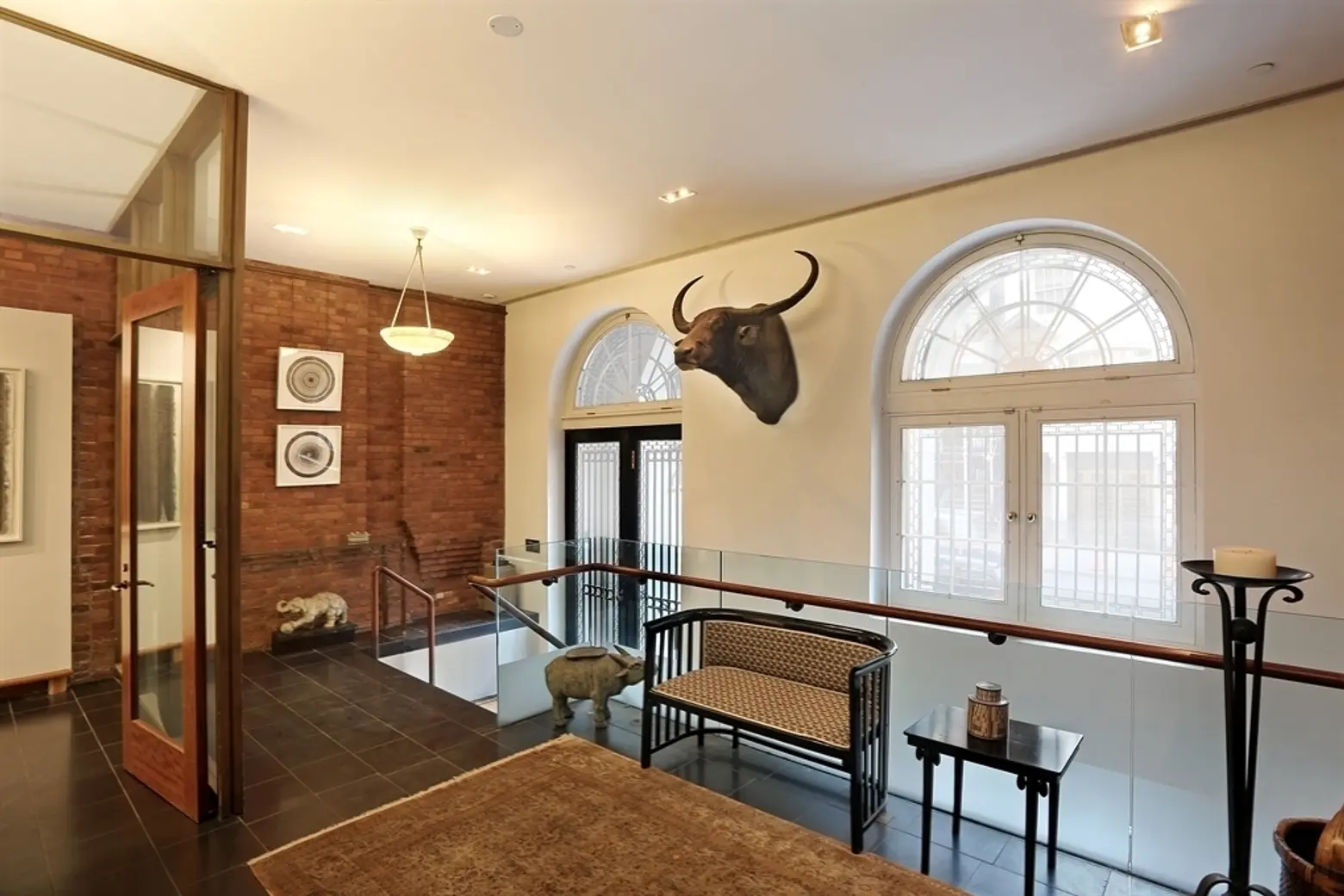 49 East 68th Street, Abby Leigh, landmarked townhome, ground-floor round-arched arcade
