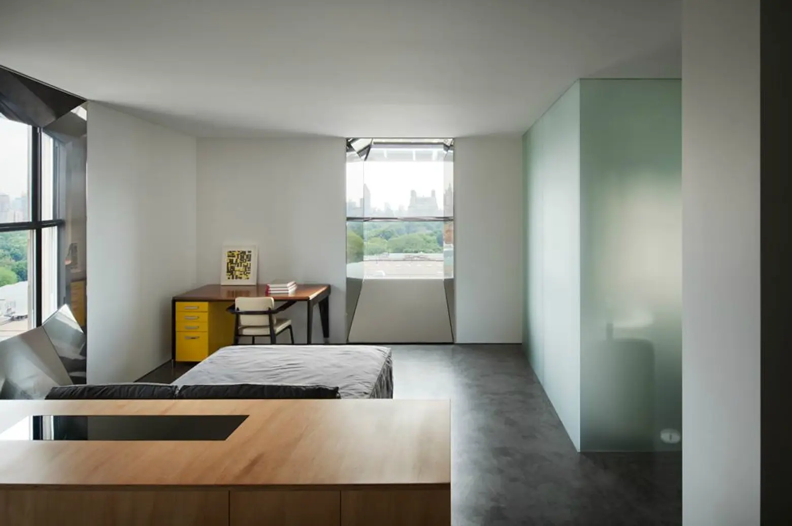 Minimalist Renovation, Thomas Phifer, Jill Sander's CEO, Fifth Avenue Apartment, Constance Darrow, and her husband Angelo Lombardi, ultra minimalistic home, ultra modern, Whitney Museum of American Art, Jean Prouvé, Jean Royère.