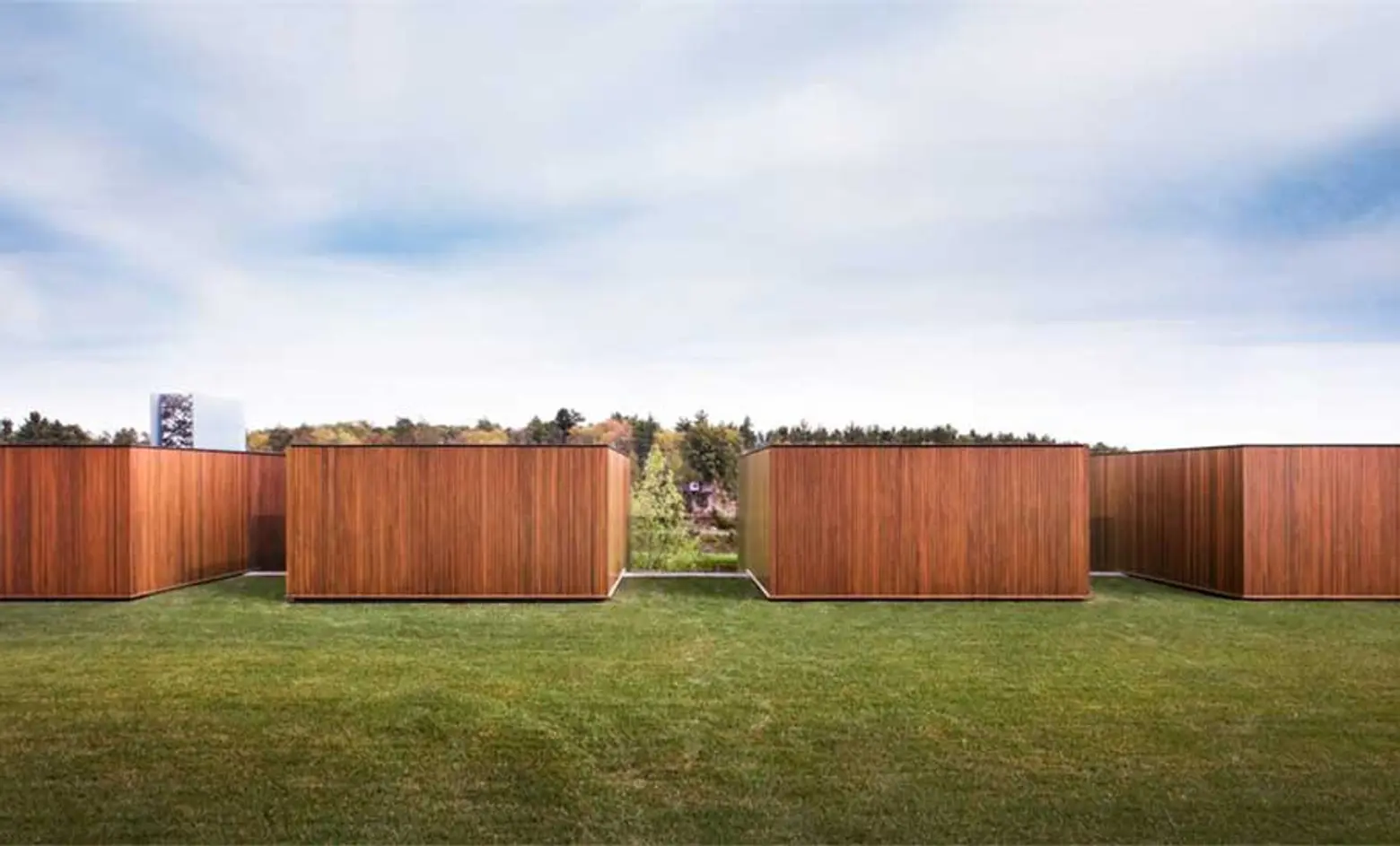 Thomas Phifer and Partners, glazed pavilion, geometrical wooden cabins, Millbrook House, geometrical modern home, Hudson River, cluster of buildings,