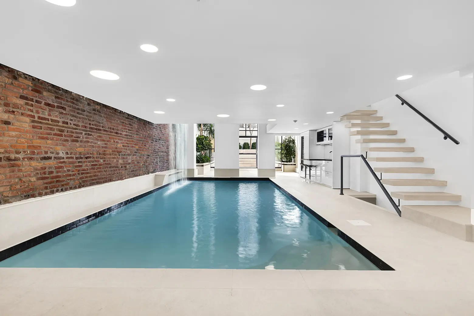 232 West 15th Street, cool listings, chelsea, swimming pool, pool, saltwater pool, pool house, waterfall, townhouse, quirky homes, manhattan townhouse for sale, interiors, pool in living room, evelyn mcmurray, evie mcmurray,