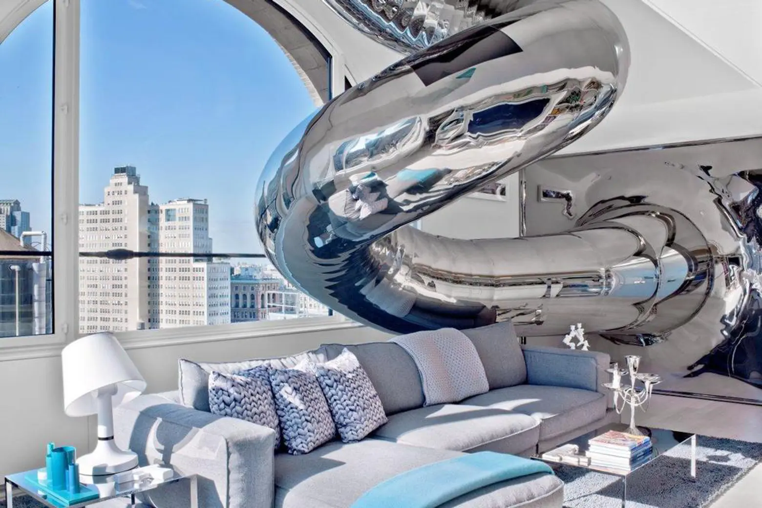 An 80-Foot Slide Winds Through This Whimsical FiDi Penthouse