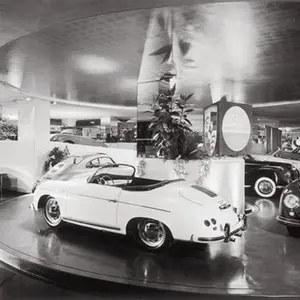 A black-and-white photo of the Frank Lloyd Wright auto showroom.