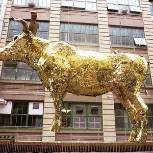 Sebastian Errazuriz’s Giant Golden Cow Piñata