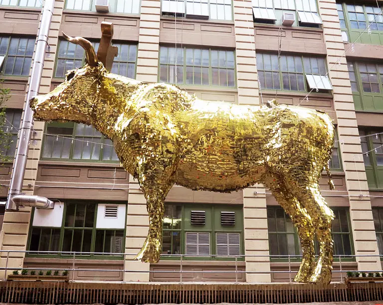 It’s a Bird, It’s a Plane, No… It’s Sebastian Errazuriz’s Giant Golden Cow Piñata!