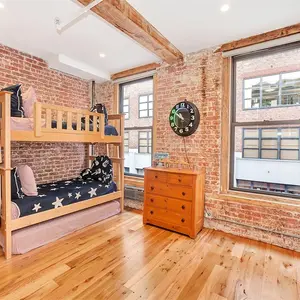 wood beams, hardwood floor, renovated chelsea loft, chef's kitchen, state-of-the-art appliances