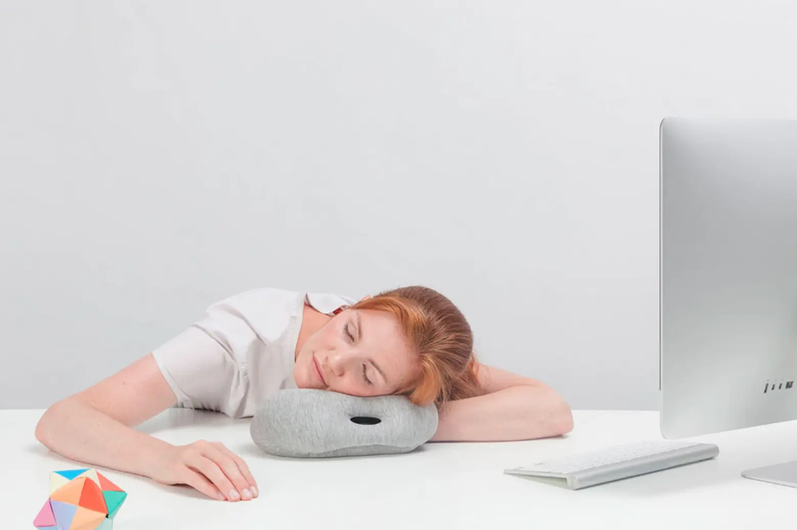 The Ostrich Pillow Mini Arms You with Comfort for Napping On-the-go