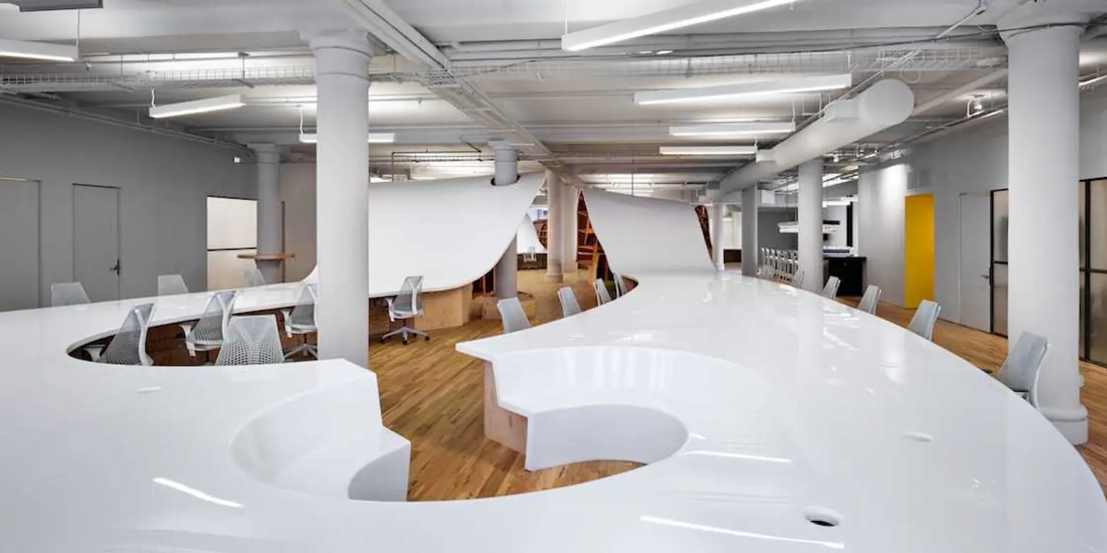 Clive Wilkinson’s 4,400-Square-Foot “Superdesk” Puts Literal Twist on Collaborative Workspace