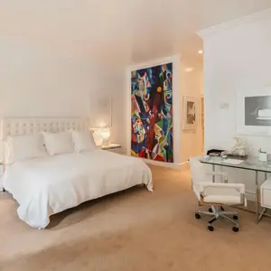 132 East 62nd Street, Suzanne Sheik, gold-plated couch and Frank Sinatra oil painting