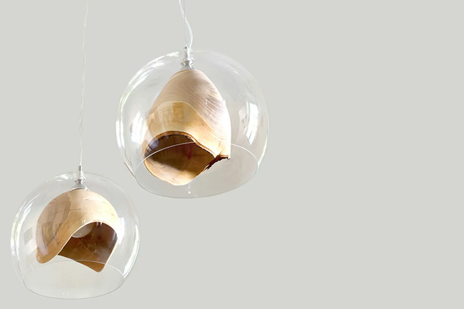 Slow Wood’s Teca Lamp Elegantly Combines Hand-Turned Wood and Blown Glass