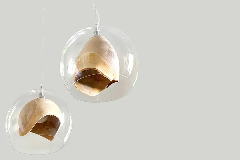 Slow Wood’s Teca Lamp Elegantly Combines Hand-Turned Wood and Blown Glass