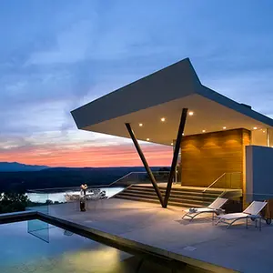 Joel Sanders Architect, House on Mt. Merino, Hudson River and Catskill Mountains, American Institute of Architecture award, V-shaped column, bamboo cladding, cedar cladding, Maarten Baas' Smoke collection, Frank Gehry's Wiggle Side Chair, house with stunning views