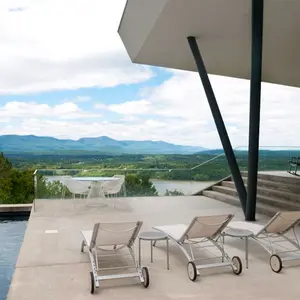 Joel Sanders Architect, House on Mt. Merino, Hudson River and Catskill Mountains, American Institute of Architecture award, V-shaped column, bamboo cladding, cedar cladding, Maarten Baas' Smoke collection, Frank Gehry's Wiggle Side Chair, house with stunning views