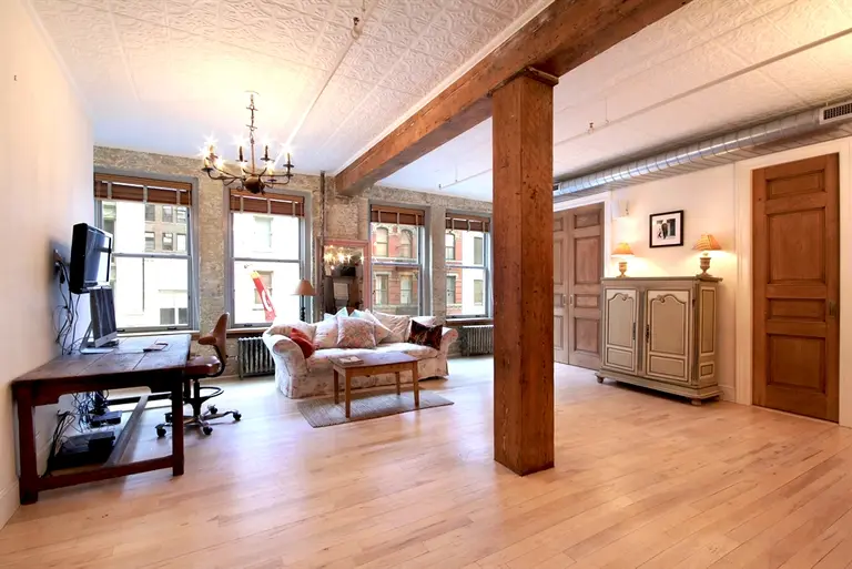 Tall Tin Ceilings Charm in This $1.4M Chelsea Loft