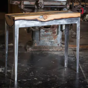 Hilla Shamia, aluminum and wood, 'Wood Casting' furniture, Holon Institute of Technology, molten aluminum, burnt wood