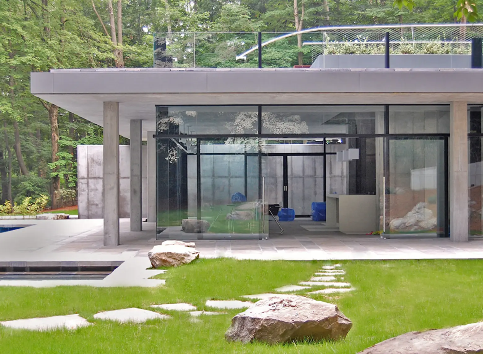 Traditional Westchester Estate Gets a Glassy Modernist Addition and Green Roof