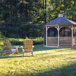 Beaverbrook Cottage, Quonset hut, country-style decoration, wooden retreat, glamping, curved roof house, garden gazebo