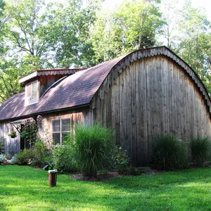Beaverbrook Cottage, Quonset hut, country-style decoration, wooden retreat, glamping, curved roof house, garden gazebo
