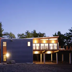 Re4a, Mountain Retreat, on stilts, Catskill Mountains, Kerhonkson, wooden deck, cedar cladding, gray concrete panels, bamboo flooring