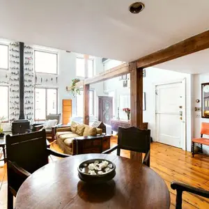 289 Bleecker Street, double-height ceilings, whitewashed exposed brick, refinished original wide plank hardwood floors