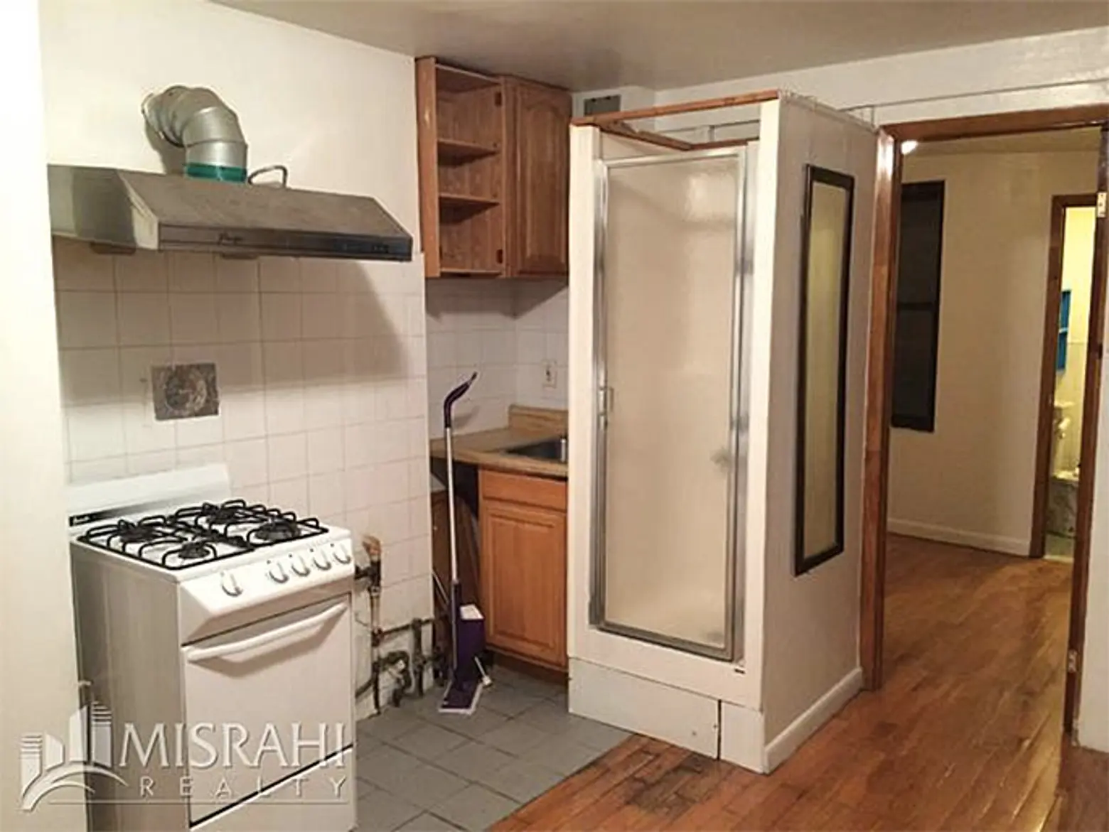 $1,795 LES Rental Proudly Features a Shower in the Kitchen