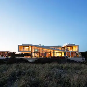 1100 Architect, sand dunes roof, Long Island House, glazed facade, natural light, minimal interiors, seaside home, slope roof, green roof,