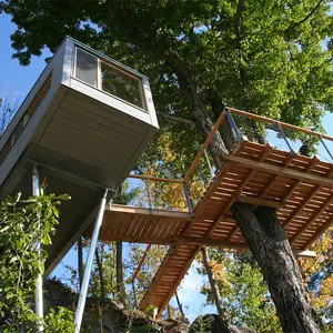 Baumraum, tree house, Cliff House, V-shaped pillar, German design, wooden interiors, modern tree house, New York