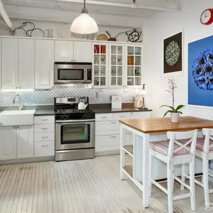 107 West 25th Street, original tin ceilings, 16-foot skylight, common roof garden and deck
