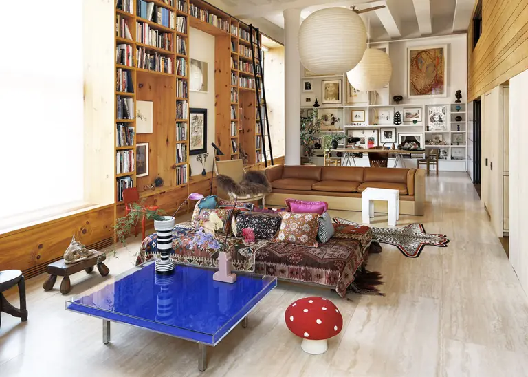 Nolita Loft Interior Boasts Floor-to-Ceiling Book Shelves, Modern Art and Woodsy Charm