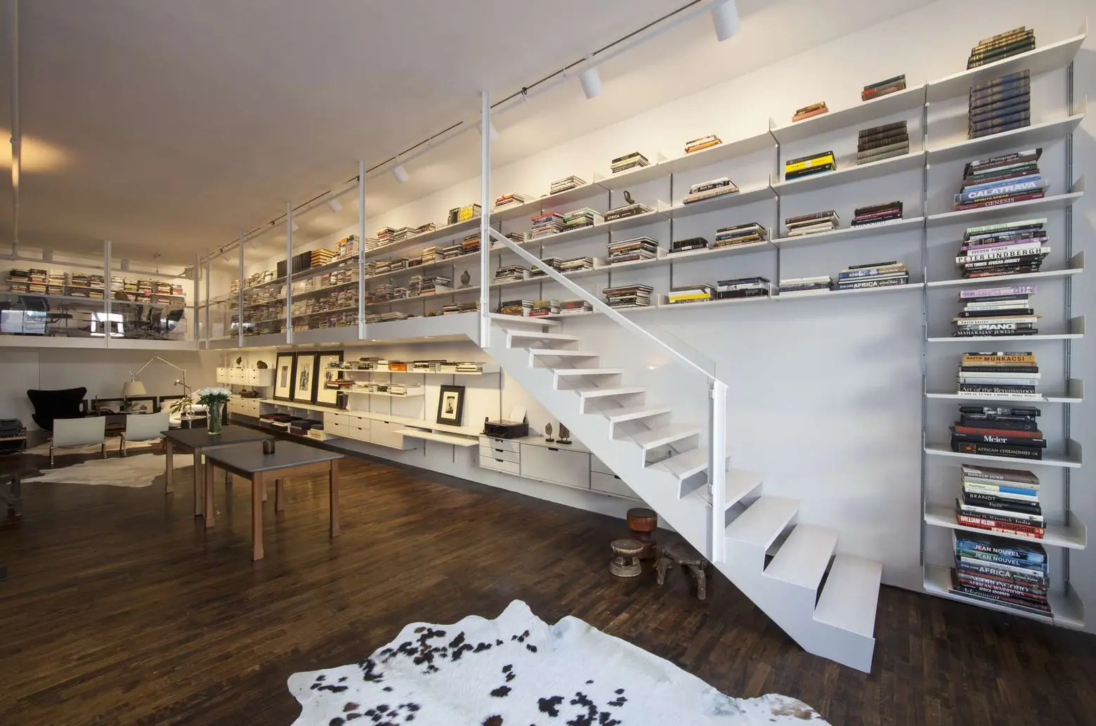 Soho Loft by SMH Architects Features a Modern Wrap-Around Library
