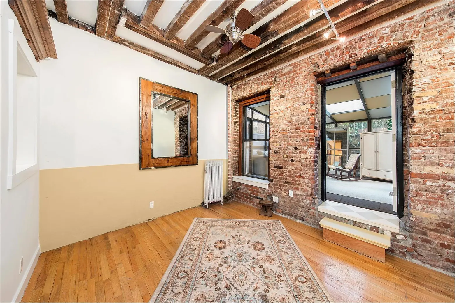 With a Cool Renovation and a Sunroom, This Tiny East Village Home Transcends the Ordinary