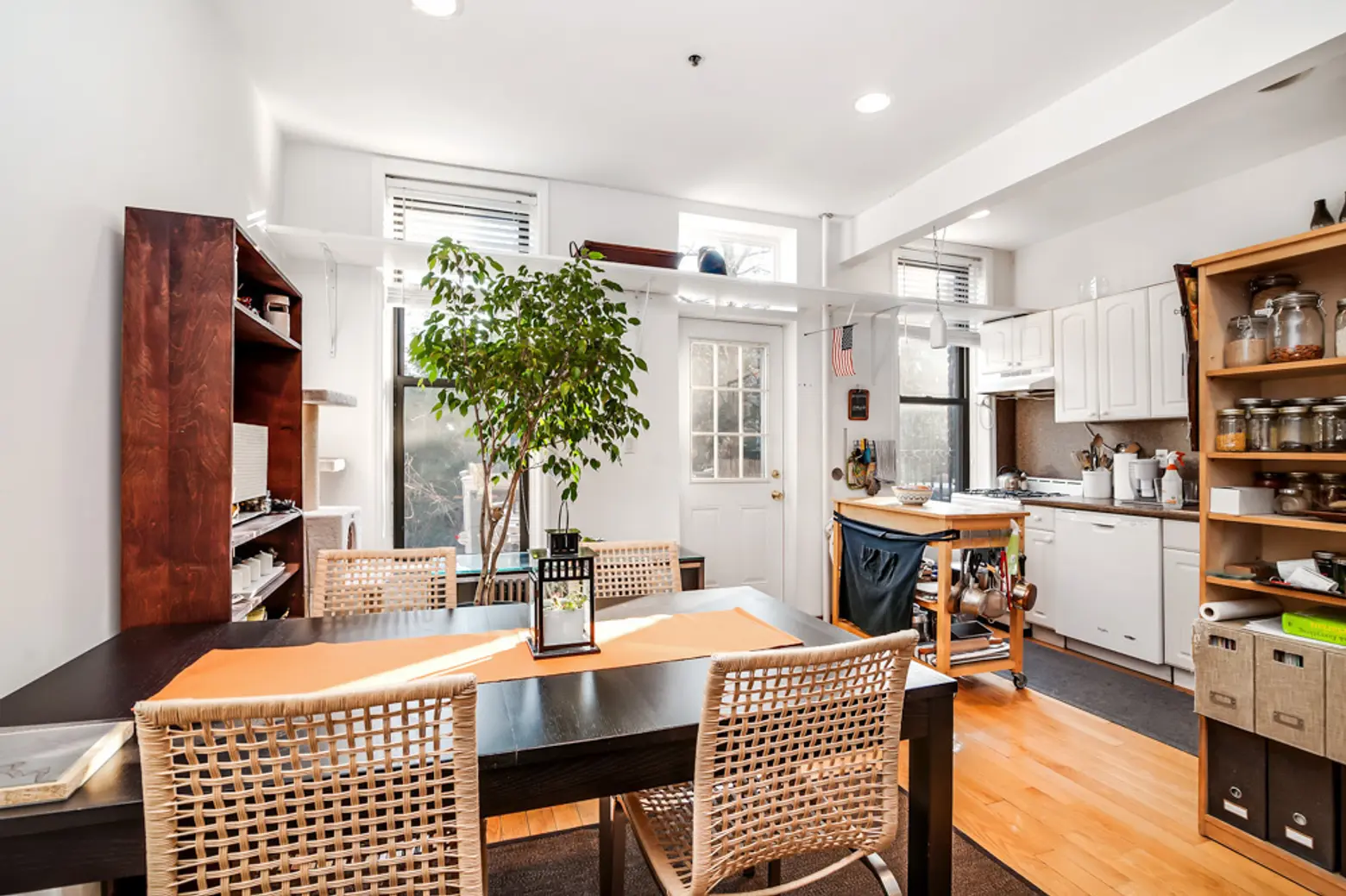 This $1.2M Row House Is in a Charming Historic Oasis Amid the Rooftop Pools of LIC