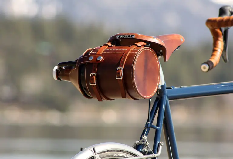 Transport Beer on Your Bike With This Hip Leather Growler Satchel