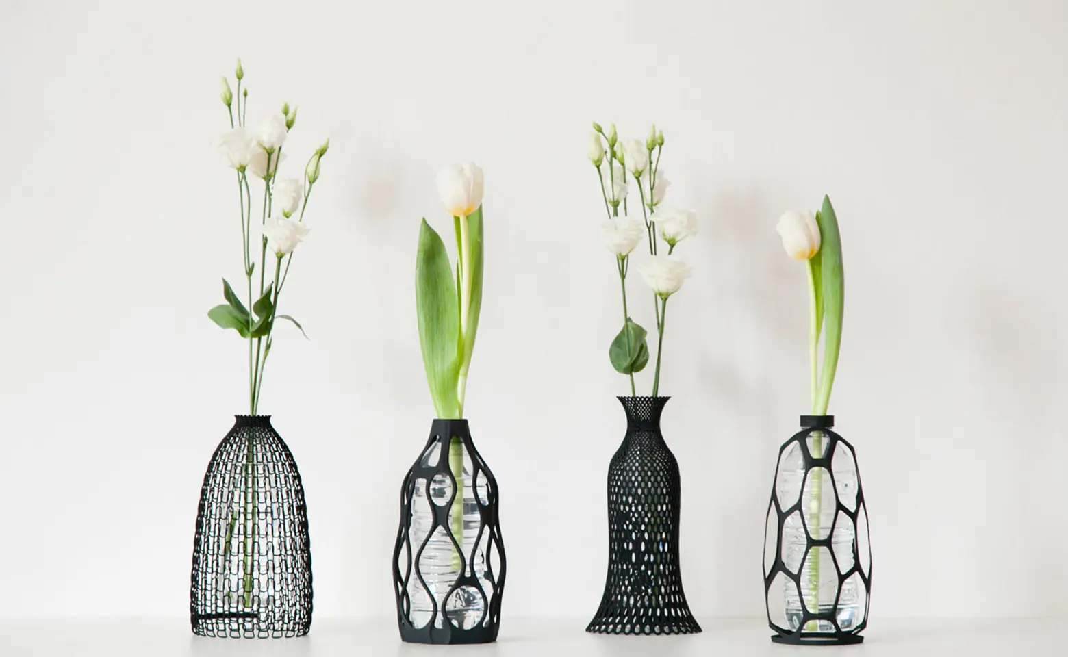 3D-Printed Vase Exteriors Give New Life to Used Plastic Bottles