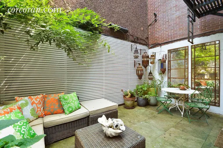 This $7,600/Month West Chelsea Duplex Has a Secret Garden and a Hidden Bedroom Bar