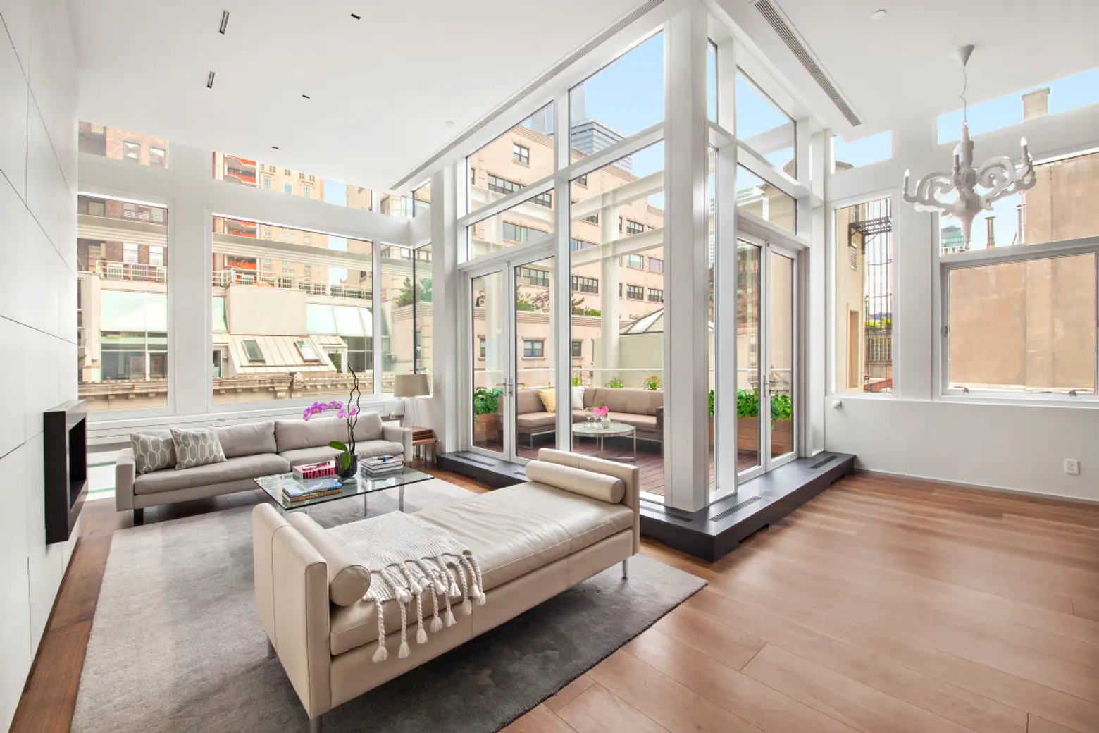 Tribeca Triplex Penthouse With Rooftop Hot Tub Swaps Astroturf for Ipe Wood and Asks $8M