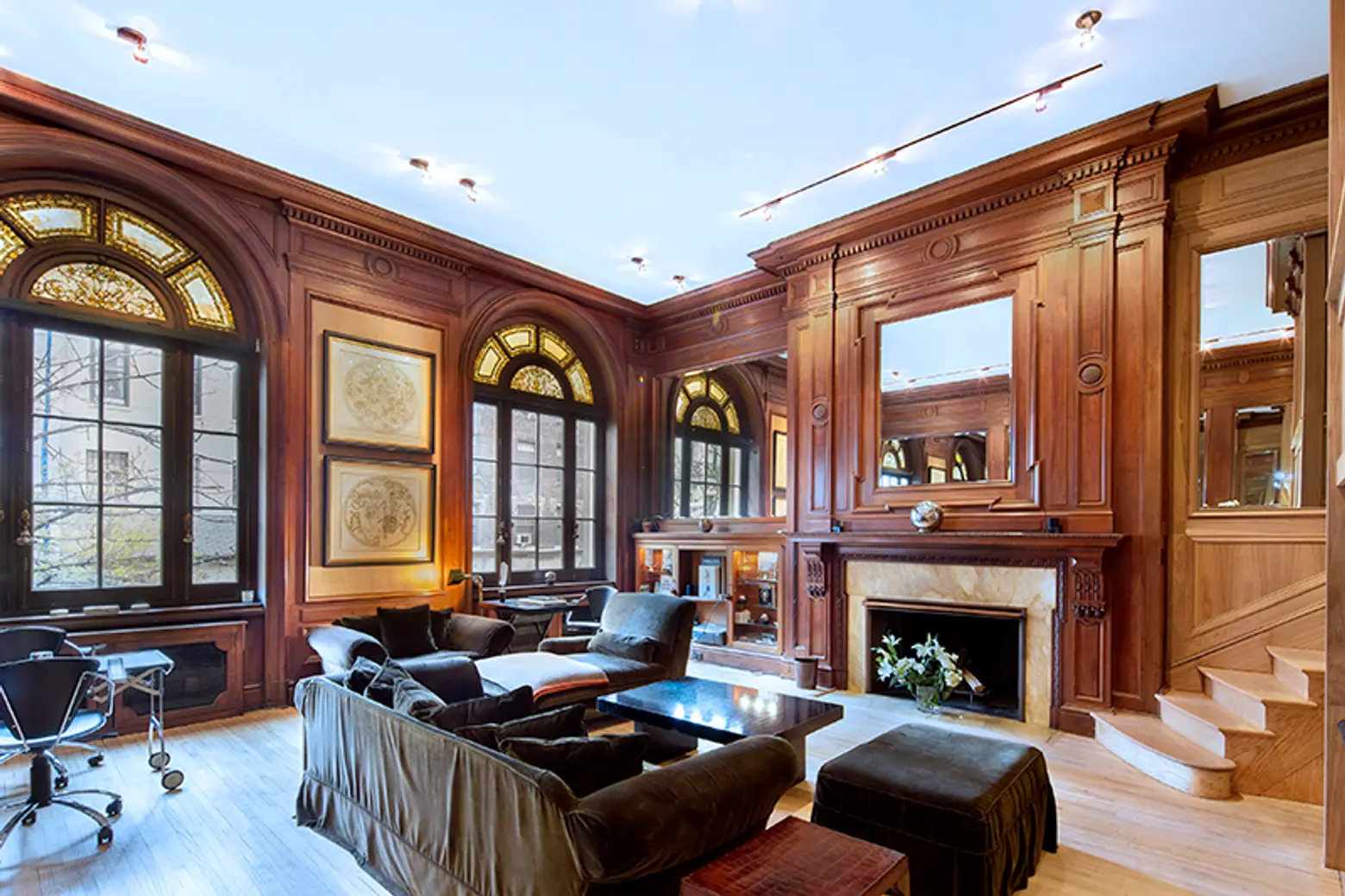 $4M UES Limestone Mansion Duplex Wows With Tiffany Windows, a Fireplace and an Elevator