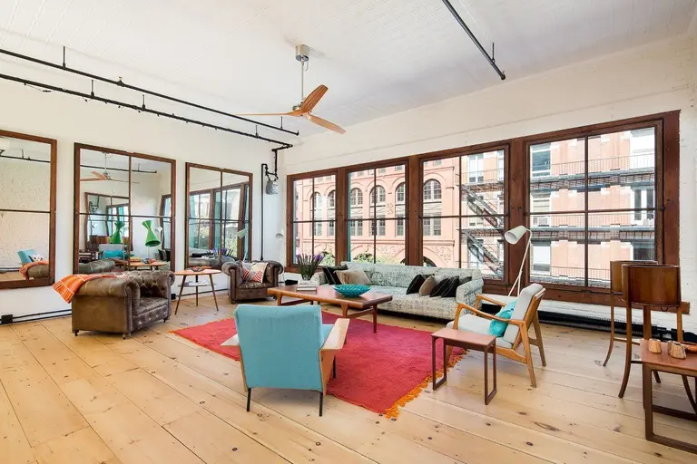 23-foot entertainment space and large roof terrace impress at this $4.8M Soho loft