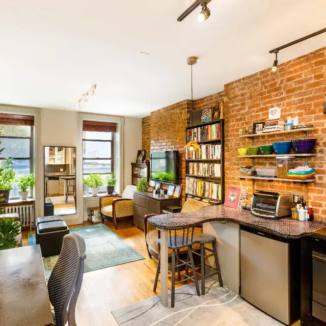 Charming Hell's Kitchen railroad apartment hits the market for $510K ...