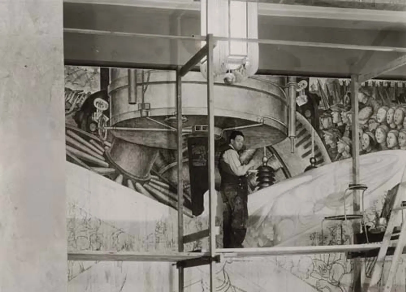 Rivera Diego working on mural in Rockefeller Center in 1933