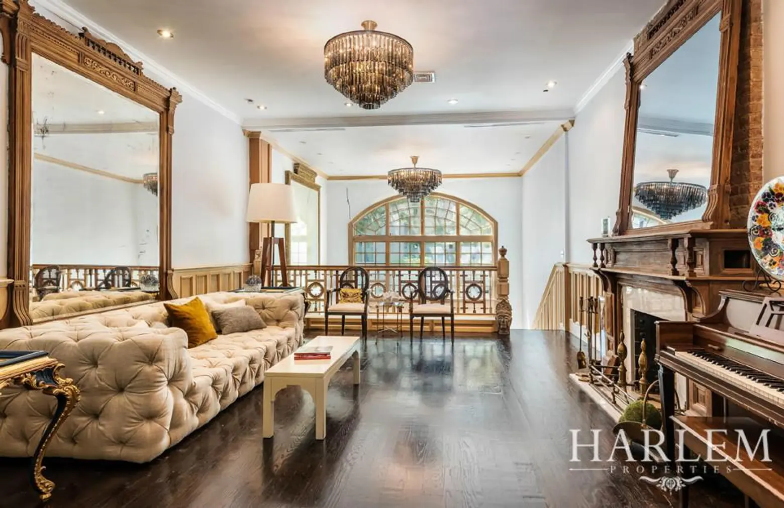 $3.65M lavish Harlem townhouse is full of marble, mirrors, and chandeliers