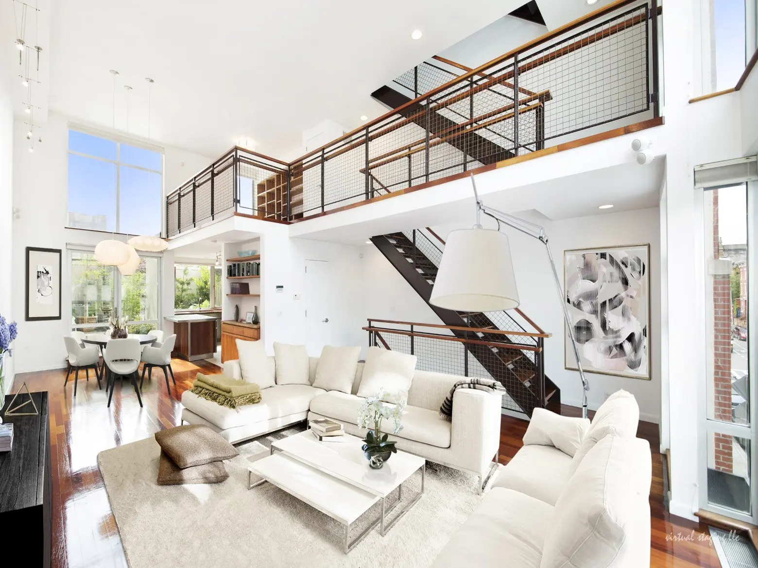 Modern $4.5M townhouse by the Williamsburg waterfront has an art studio, parking and four terraces