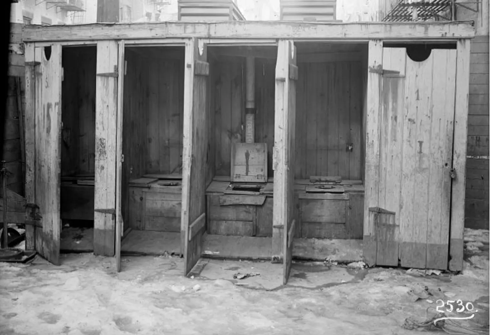 row of outhouses
