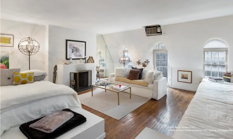 This $675K prewar studio is right across from the Museum of Modern Art