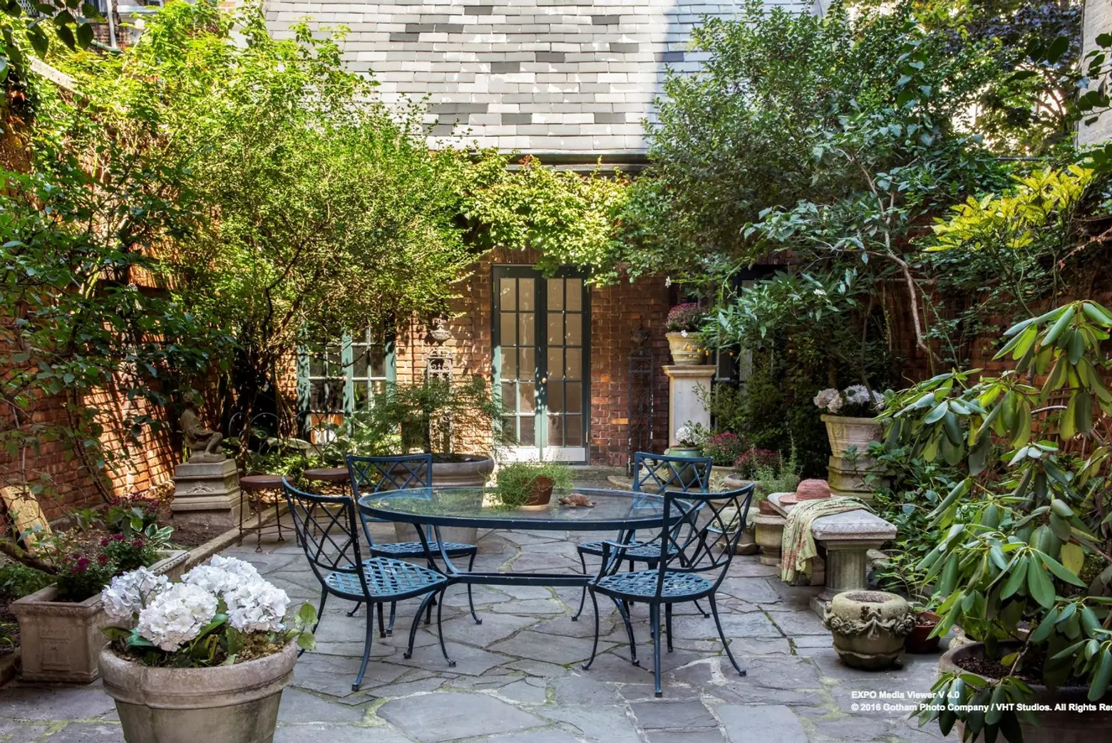 $16.8M Village townhouse has details, a celebrity history–and a secret artists’ cottage in back